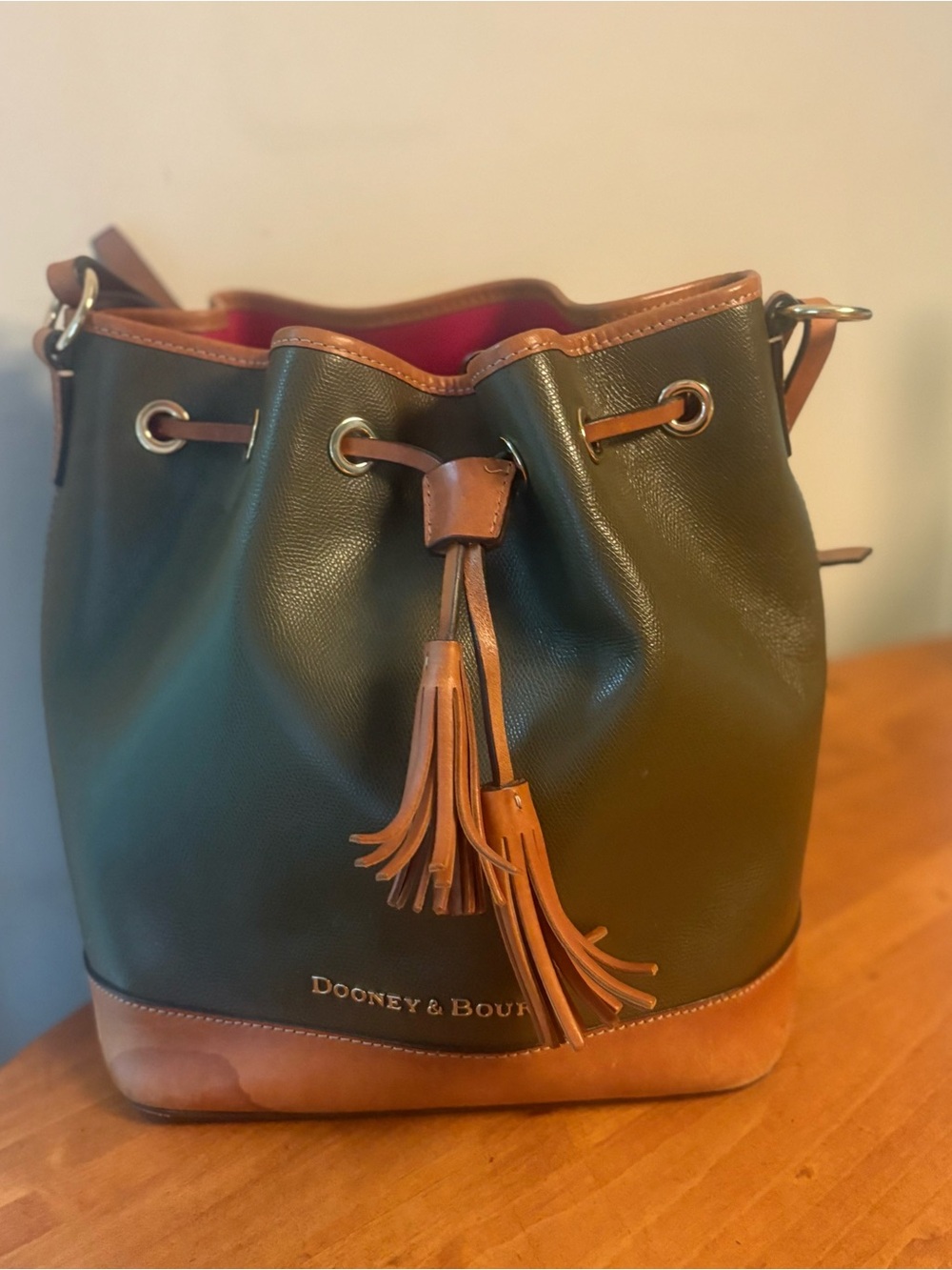 Dooney & Bourke Dark Green Leather Drawstring Bucket Bag with Tan Trim
